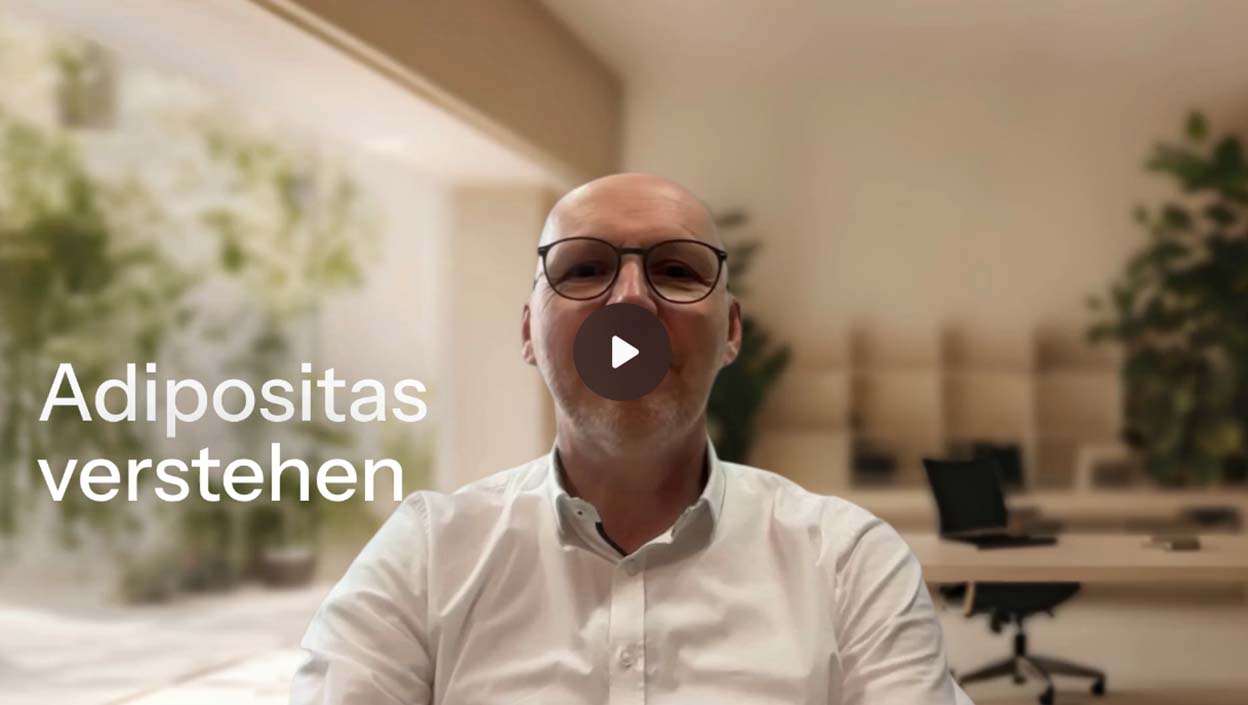 Prof. Dr. Herrmann, der in ein Video-Thumbnail mit dem Text Adipositas blickt